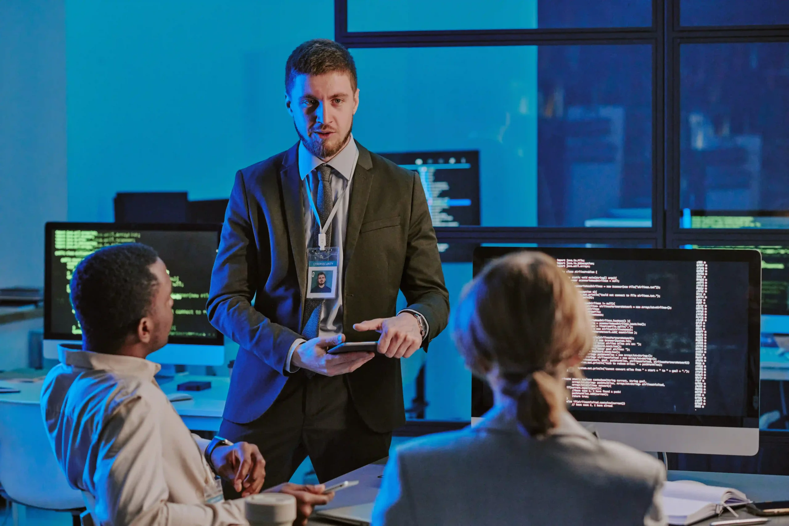 Professional IT services team discussing security and uptime