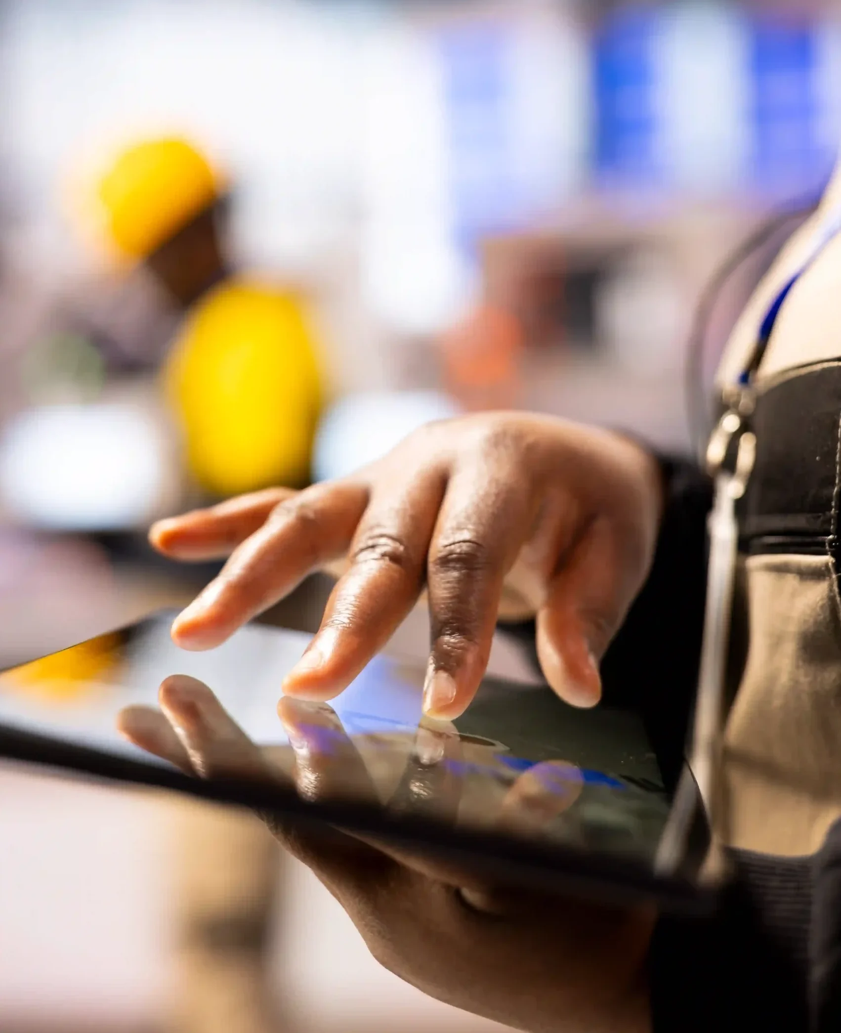Proactive maintenance technician checking systems with tablet